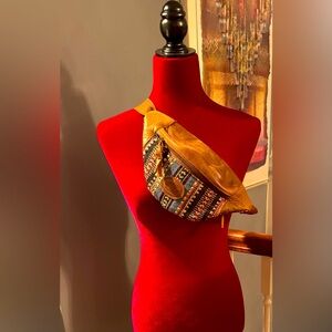 Roots Canada  leather and tapestry zipper front and back pocket bag fanny pack